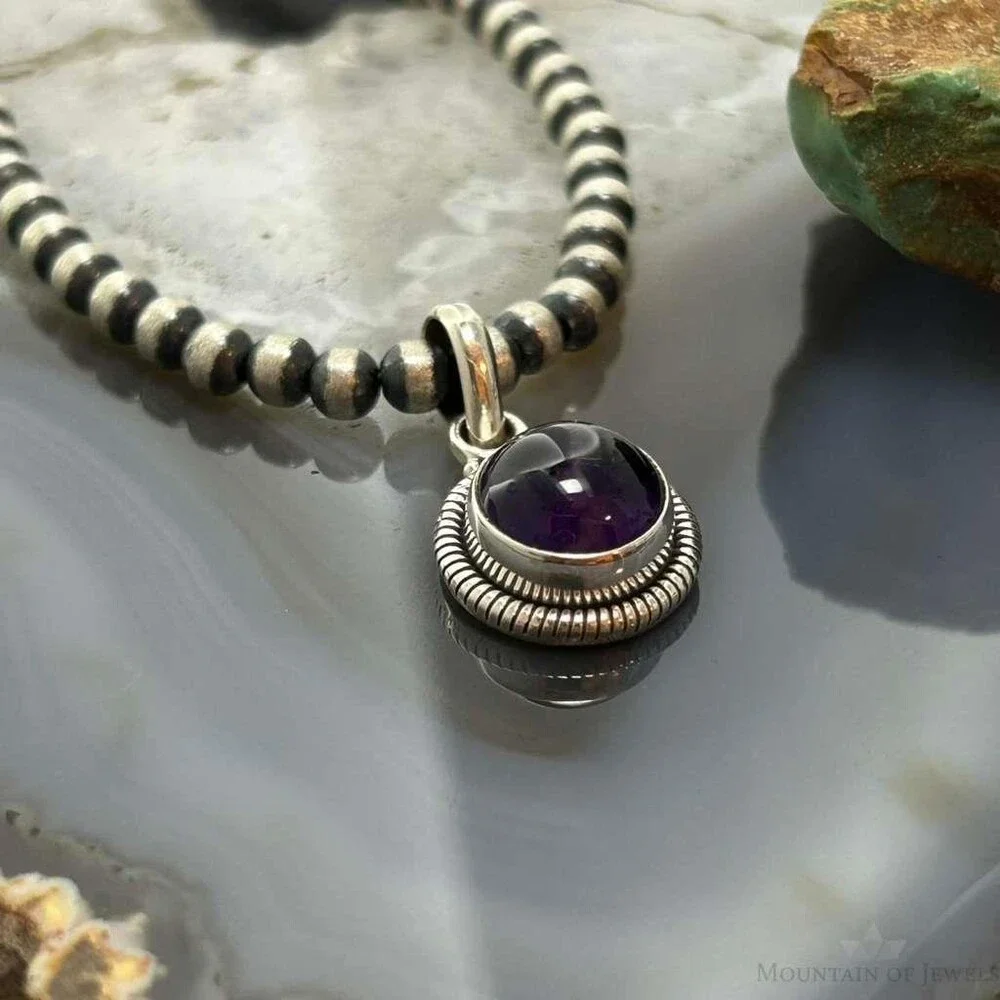 Sterling Southwestern Style Round Amethyst Decorated Charm/Pendant For Women